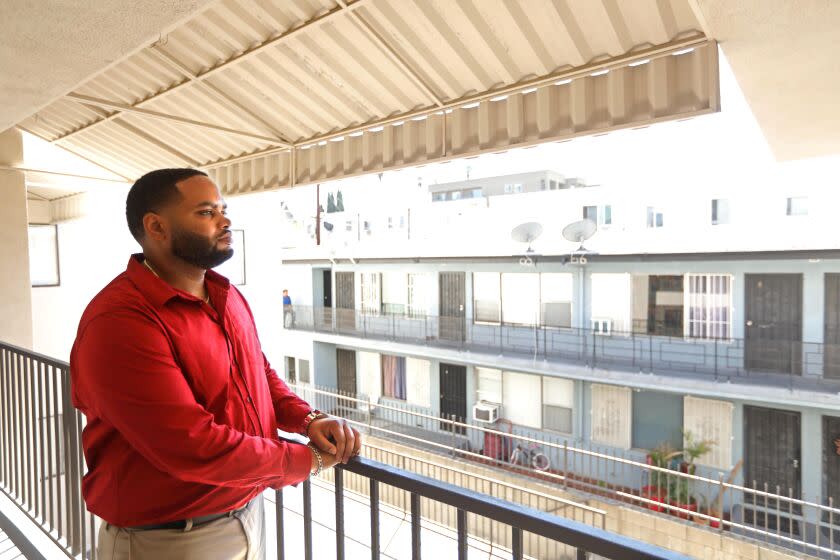 LOS ANGELES, CA - OCTOBER 18, 2022 - - Robert Gardner, a Section 8, tenant who was denied numerous times by landlords who said they didn't take Section 8, stands in the apartment building where he currently lives in Los Angeles on October 18, 2022. It took Gardner months until he finally found a landlord who would agree to take his Section 8 voucher. Two years ago, the city and state passed laws that barred landlords from refusing to take Section 8 residents. But tenants and activists say this continues. (Genaro Molina / Los Angeles Times)