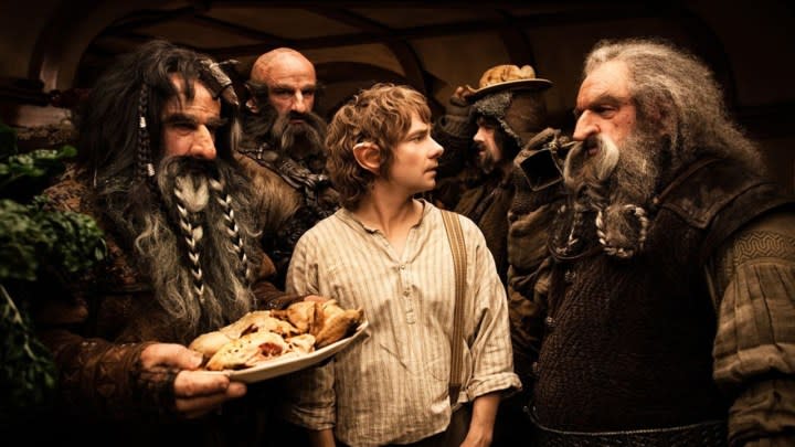 Bilbo Baggins surrounded by others in a scene from The Hobbit: An Unexpected Journey.