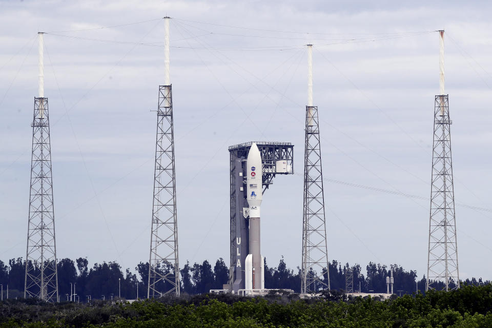 A United Launch Alliance Atlas V rocket that will launch to Mars arrives at Space Launch Complex 41 at the Cape Canaveral Air Force Station, Tuesday, July 28, 2020, in Cape Canaveral, Fla. The rocket scheduled to launch on Thursday will land on Mars in February 2021 and the Mars 2020 rover, named Perseverance, will study Martian geology. (AP Photo/John Raoux)