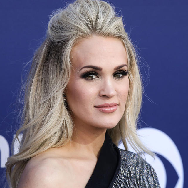 Carrie Underwood Dazzles In Stunning Metallic Bodysuit & Plays