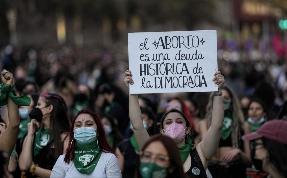 Abortion rights demonstrators march during a Global Day of Action for access to legal, safe and free abortion in Santiago, Chile - Esteban Felix/AP