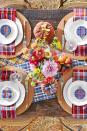 <p>Your garden's bounty will really pop against a sea of plaid. Arrange a colorful assortment of daisies, chrysanthemums and peonies to play up the vibrant hues in your other table linens and decor.</p><p><strong>RELATED:</strong> <a href="https://www.goodhousekeeping.com/home/gardening/g22563541/fall-flowers/" rel="nofollow noopener" target="_blank" data-ylk="slk:Fall Flowers That Are in Season Right Now;elm:context_link;itc:0;sec:content-canvas" class="link ">Fall Flowers That Are in Season Right Now</a></p>