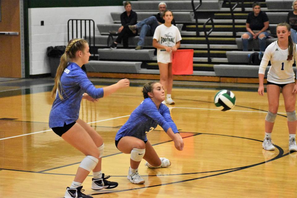 Martinsville's Emily Martin extends for a dig during the Artesians' matchup with Monrovia on Aug. 25, 2022