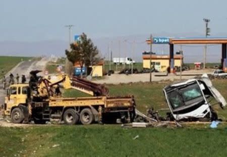 A military vehicle, damaged by a remote control bomb, is pictured near Diyarbakir, Turkey February 18, 2016. A bomb detonated by remote control killed seven Turkish security force members travelling in a military vehicle in southeast Turkey on Thursday, security sources said, a day after a car bomb attack in the capital Ankara killed 28 people. The blast hit the armoured vehicle on the highway linking Diyarbakir, the largest city in the mainly Kurdish southeast, to the district of Lice. Sources had previously said the explosion hit a convoy of vehicles. REUTERS/Sertac Kayar