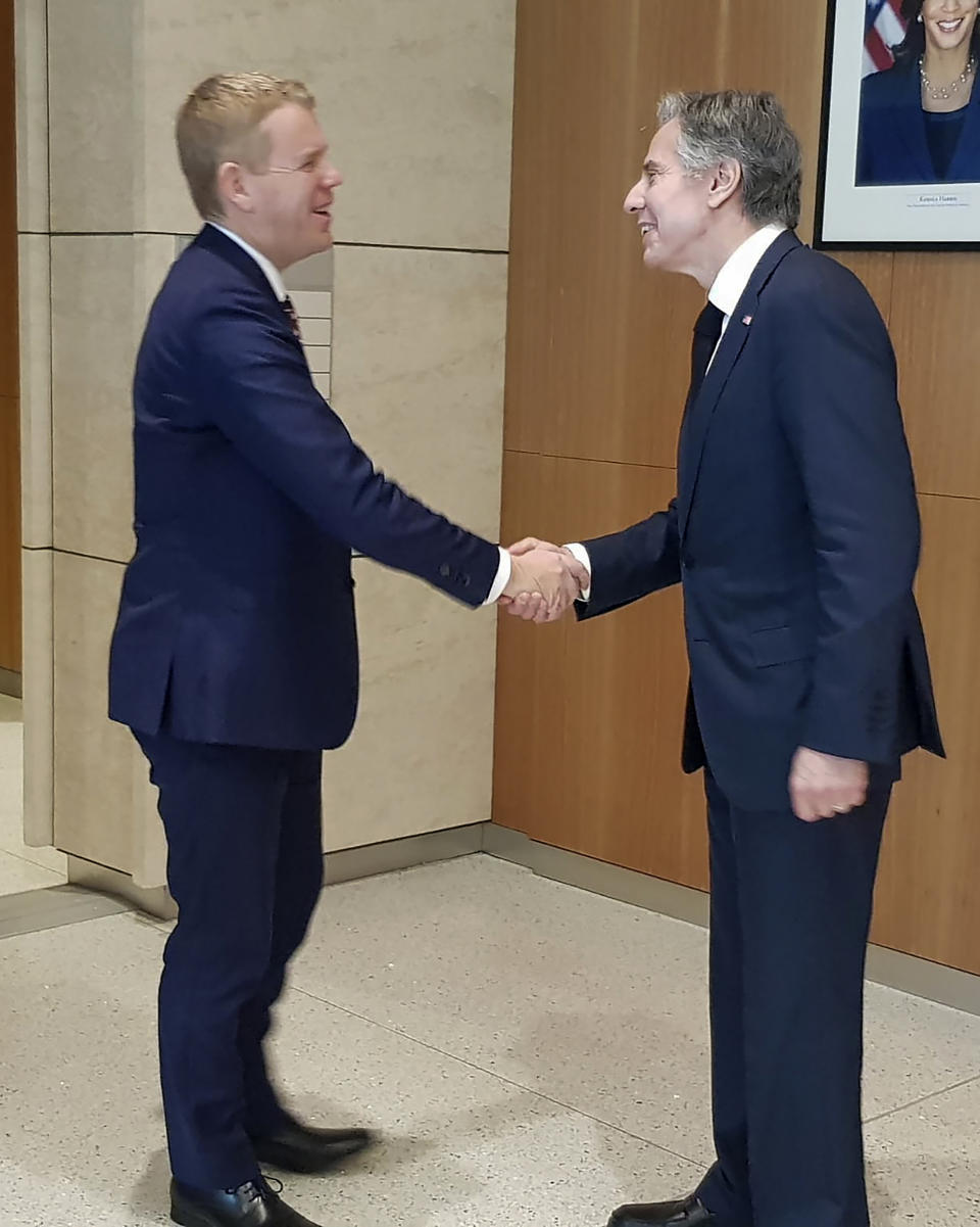 In this image released by New Zealand Prime Minister's Office, New Zealand Prime Minister Chris Hipkins, left, meets with U.S. Secretary of State Antony Blinken in Port Moresby, Papua New Guinea, Monday, May 22, 2023. The United States is scheduled to sign a new security pact with Papua New Guinea on Monday as the U.S. continues to jostle with China for influence in the Pacific. (Charlotte Gendall/New Zealand Prime Minister's Office via AP)