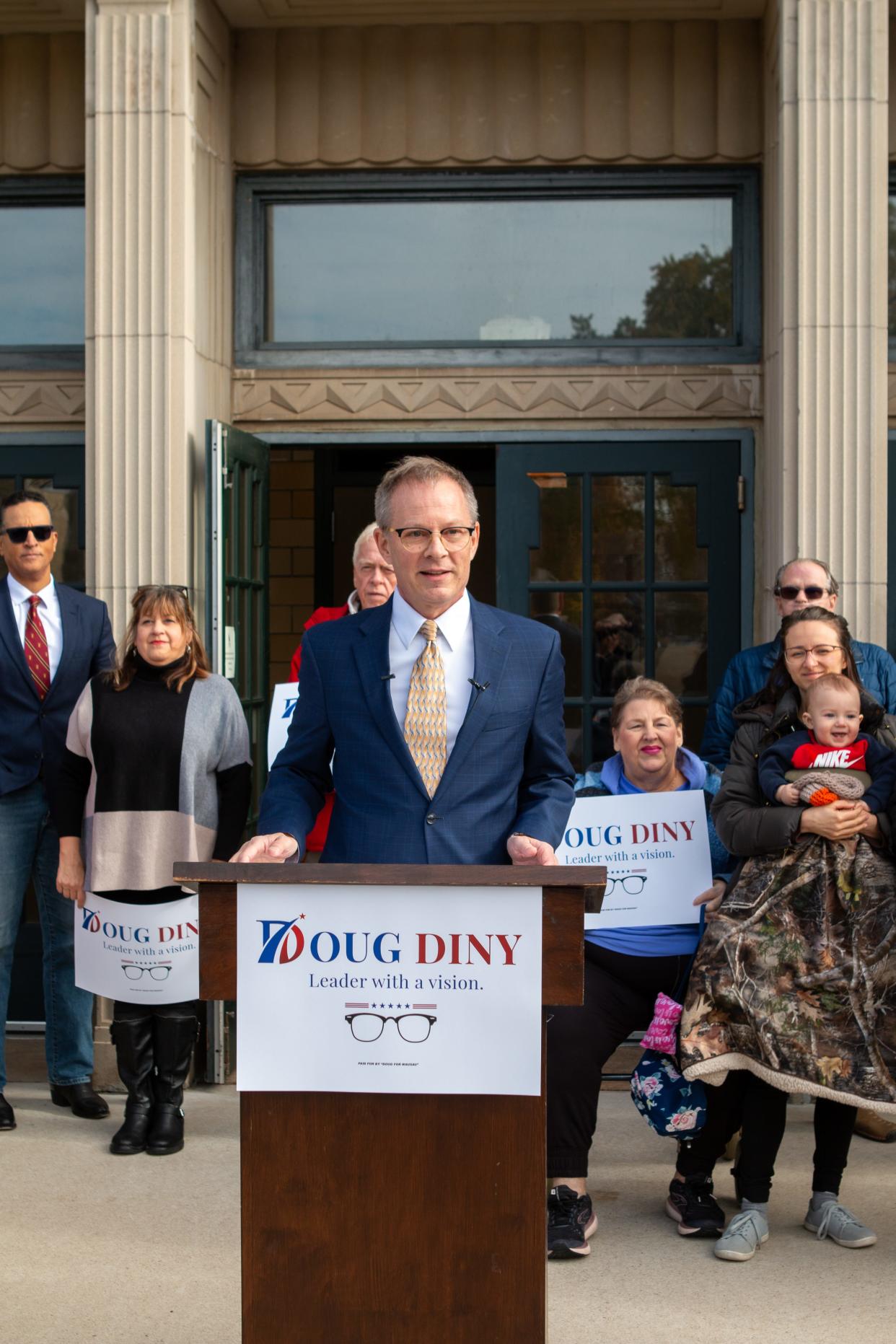 District 4 alderperson Doug Diny announces his candidacy for mayor Wednesday in front of East High Apartments in Wausau.