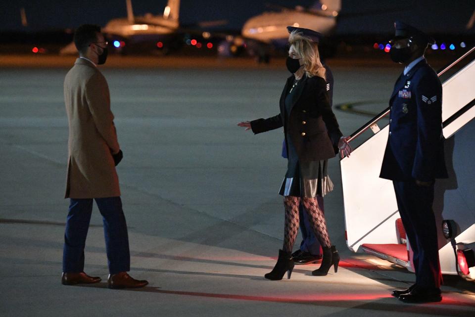 US First Lady Jill Biden wearing fishnet style patterned tights and mini skirt 