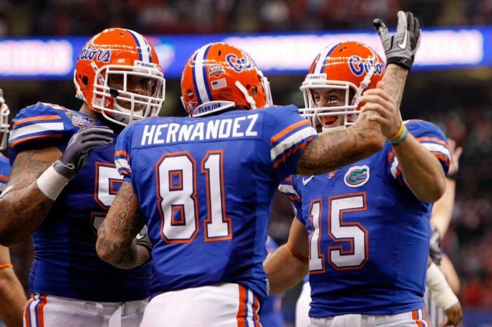 Aaron Hernandez celebrates with his teammates Mike Pouncey and Tim Tebow after scoring a touchdown in the first quarter against the Cincinnati Bearcats during the Allstate Sugar Bowl at the Louisana Superdome on January 1, 2010 in New Orleans, Louisiana. Mike Pouncey said he was ‘surprised’ by the revelation that Aaron Hernandez had a severe case of CTE, but that ‘it’s real.’