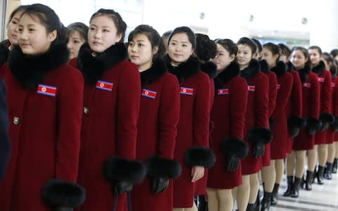 North Korean cheering squads leaving the Pyeongchang 2018 Winter Olympics for North Korea  - Credit: REUTERS/Kim Hee-Chul/Pool