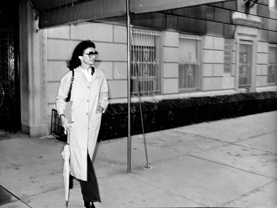 Jackie Kennedy Onassis leaving her Fifth Avenue apartment in New York City.