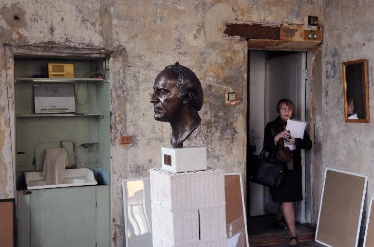 A woman visits the museum-apartment Joseph Brodsky in Saint Petersburg, on May 22, 2015