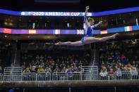 Sarah Voss of Germany performs on the beam during the America Cup gymnastics competition Saturday, March 7, 2020, in Milwaukee. (AP Photo/Morry Gash)