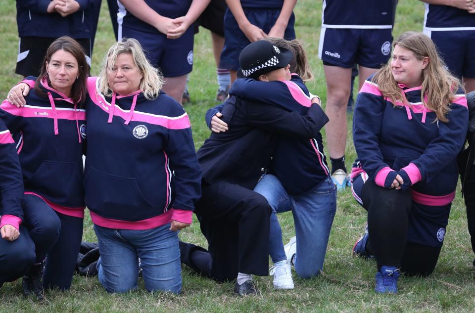 Players observe a minute's silence at East Grinstead rugby club - Gareth Fuller/PA Wire