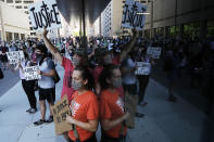 Demonstrators gather in St. Paul, Minn. on Friday, June 5, 2020. Protests continue over the death of George Floyd, a black man who died while in police custody in Minneapolis. (AP Photo/Julio Cortez)