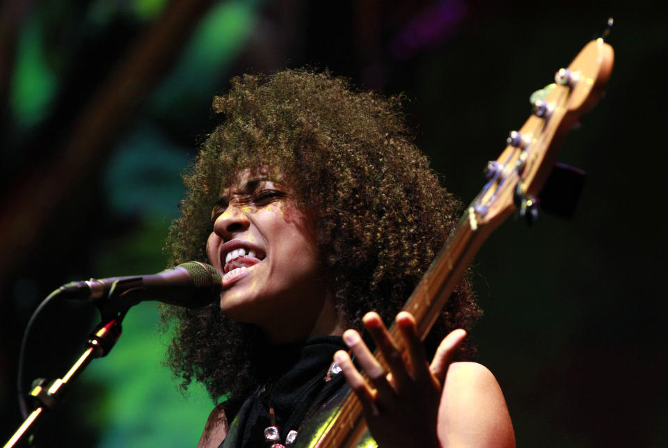 Singer Esperanza Spalding performs at the annual Starbucks shareholders meeting Wednesday, March 21, 2012, in Seattle. (AP Photo/Elaine Thompson)