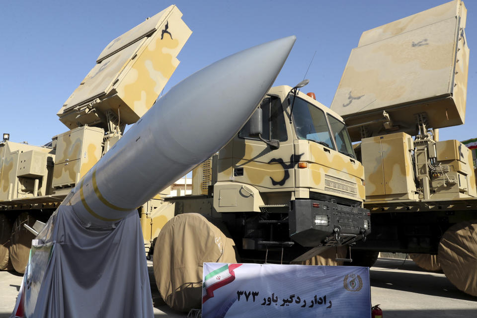 In this photo released by the official website of the office of the Iranian Presidency, Iran-made Bavar-373 air-defense missile system is seen after being unveiled by President Hassan Rouhani, Iran, Thursday, Aug. 22, 2019. Iran says the Bavar-373 is a long-range surface-to-air missile system able to recognize up to 100 targets at a same time and confront them with six different weapons. (Iranian Presidency Office via AP)