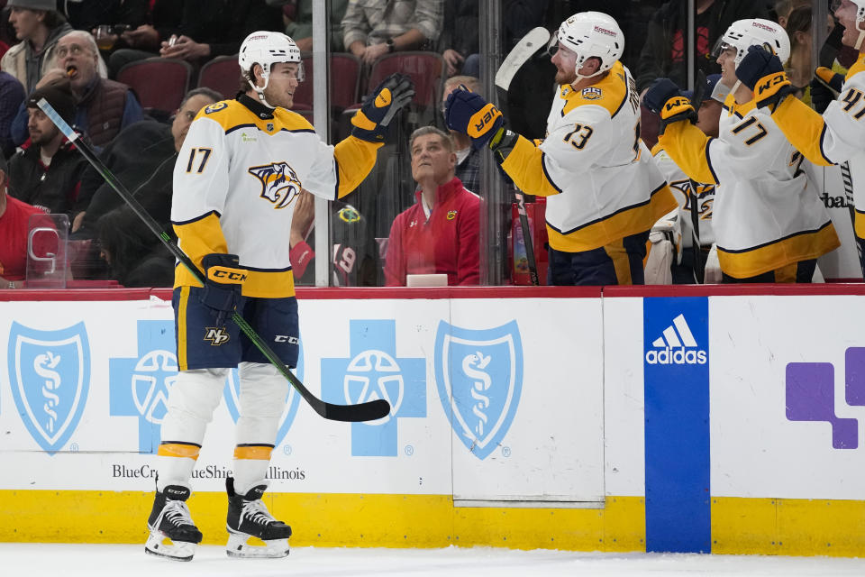 Nashville Predators center Mark Jankowski, left, celebrates his goal during the second period an NHL hockey game against the Chicago Blackhawks Tuesday, Dec. 5, 2023, in Chicago. (AP Photo/Erin Hooley)
