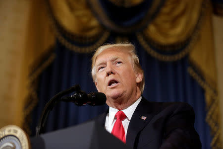 U.S. President Donald Trump calls on Republican Senators to move forward and vote on a healthcare bill to replace the Affordable Care Act in the Blue Room of the White House in Washington, U.S., July 24, 2017. REUTERS/Joshua Roberts