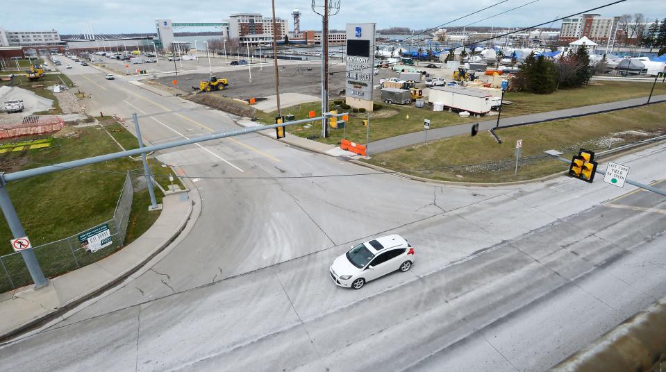 Traffic moves along the Bayfront Parkway at Sassafras Street Extension in Erie. A roundabout will be built at the intersection to improve traffic flow near Presque Isle Bay and bayfront attractions, top.