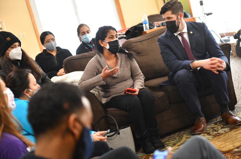 Ma Elena Gutierrez speaks during a meeting between state lawmakers and local residents about a proposed $1,500 state payment to frontline workers Friday, Feb. 11, 2022, at the Catholic Charities Youth House in St. Cloud. 