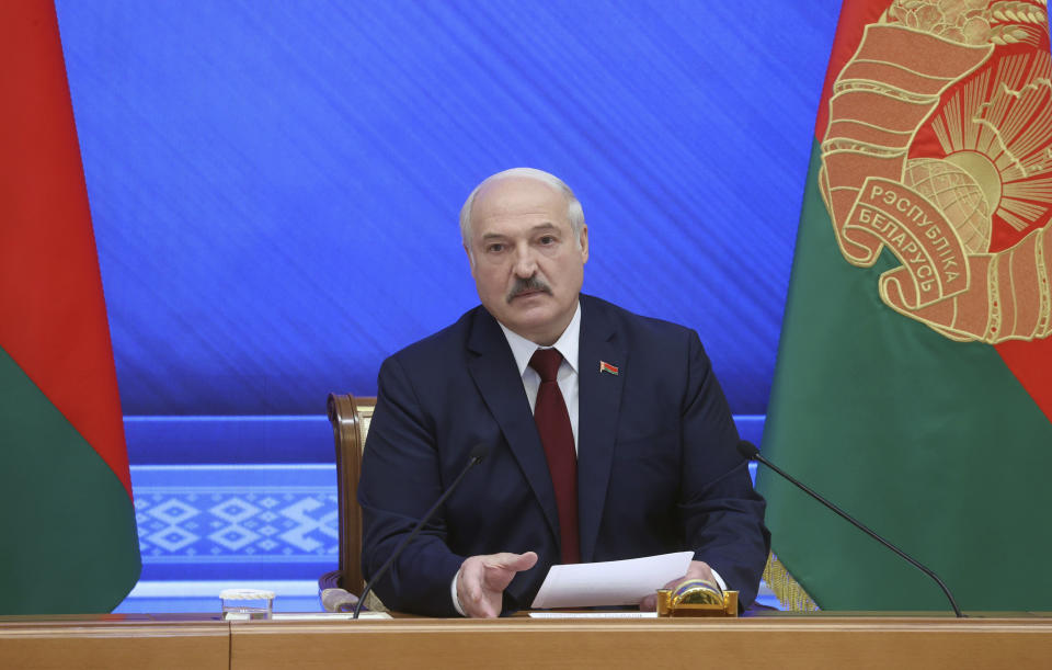 Belarusian President Alexander Lukashenko speaks during an annual press conference in Minsk, Belarus, Monday, Aug. 9, 2021. Belarus' authoritarian leader on Monday charged that the opposition was plotting a coup in the runup to last year's presidential election that triggered a monthslong wave of mass protests. President Alexander Lukashenko held his annual press conference on Monday, the one-year anniversary of the vote that handed him a sixth term in office but was denounced by the opposition and the West as rigged. (Nikolay Petrov/BelTA photo via AP)