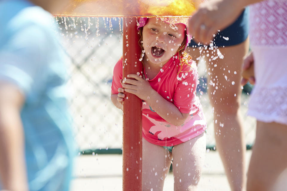 Raegan Sack, 4, cools off at Max Patterson Park during a record setting heat wave in Gladstone, Ore., Sunday, June 27, 2021. Yesterday set a record high for the day with more records expected today. (AP Photo/Craig Mitchelldyer)