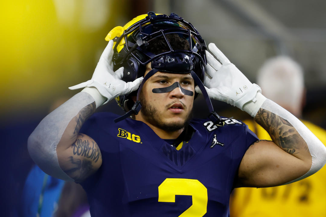 HOUSTON, TX - JANUARY 08: Michigan Wolverines running back Blake Corum (2) sets his helmet on his head during warmups before the CFP National Championship game Michigan Wolverines and Washington Huskies on January 8, 2024, at NRG Stadium in Houston, Texas. (Photo by David Buono/Icon Sportswire via Getty Images)