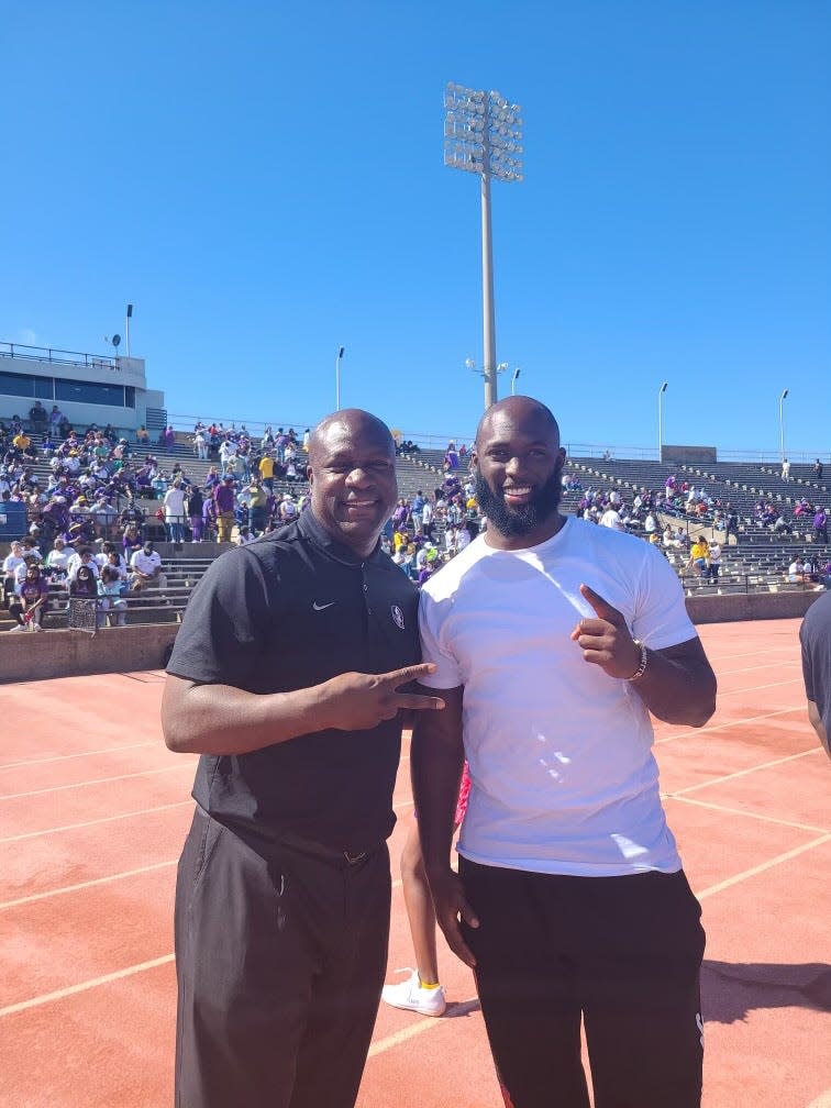 Florida State running backs coach David Johnson (left) poses for a picture with former LSU and current Tampa Bay Buccaneers running back Leonard Fournette at a St. Augustine High football game in New Orleans last year.