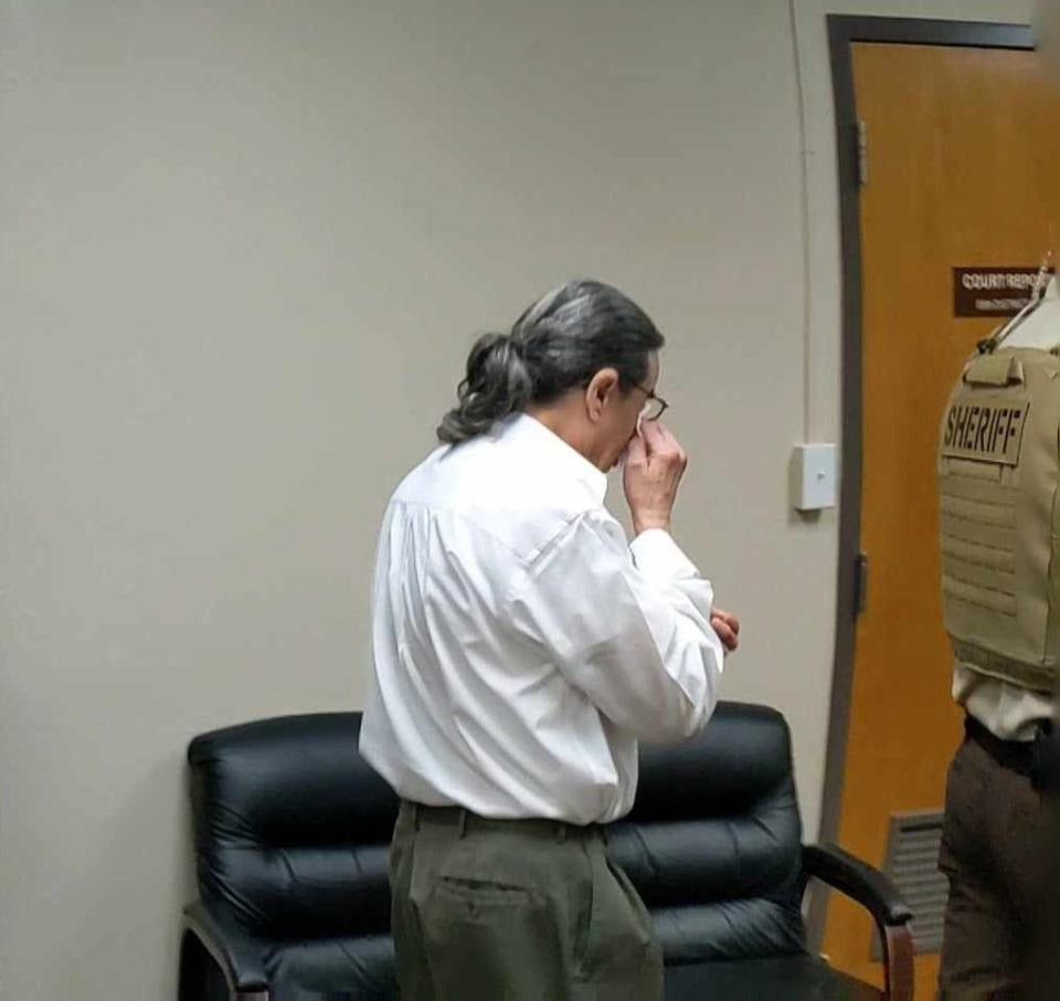 William Mark Crump dabs at his eyes with a tissue Thursday, Feb. 8, 2024, while leaving 89th District Court after listening to victim impact statements and receiving a punishment verdict from the jury for automatic life in prison for aggravated sexual assault of a child.