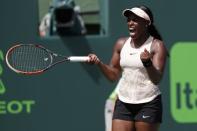 Mar 29, 2018; Key Biscayne, FL, USA; Sloane Stephens of the United States celebrates after match point against Victoria Azarenka of Belarus (not pictured) in a women's singles semi-final of the Miami Open at Tennis Center at Crandon Park. Mandatory Credit: Geoff Burke-USA TODAY Sports