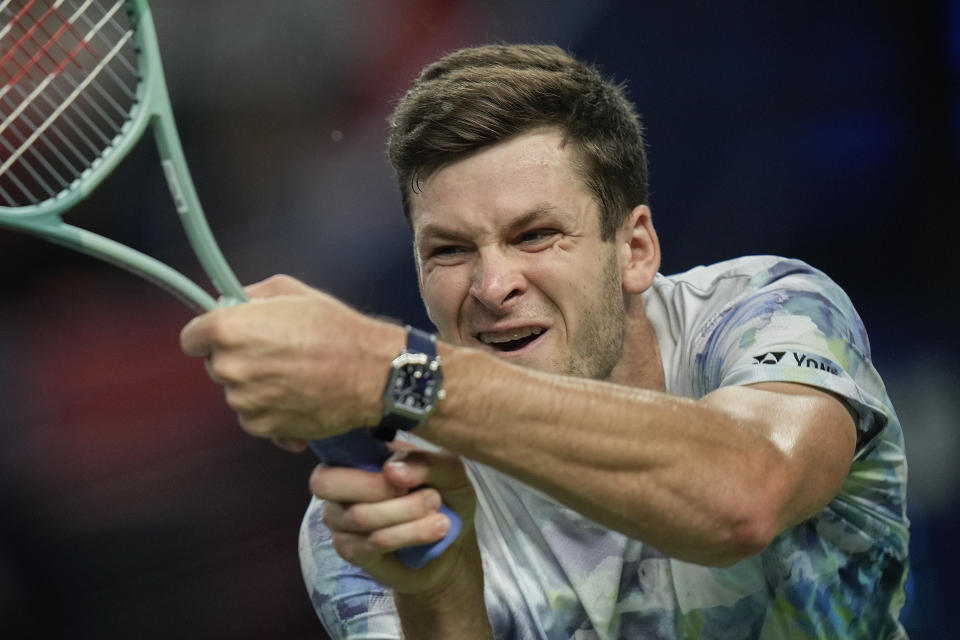 Hubert Hurkacz of Poland returns a shot to Andrey Rublev of Russia during the men's singles final match of the Shanghai Masters tennis tournament at Qizhong Forest Sports City Tennis Center in Shanghai, China, Sunday, Oct. 15, 2023. (AP Photo/Andy Wong)