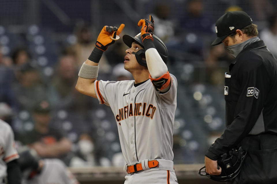 San Francisco Giants' Mauricio Dubon reacts after hitting a home run during the fifth inning of a baseball game against the San Diego Padres, Saturday, May 1, 2021, in San Diego. (AP Photo/Gregory Bull)