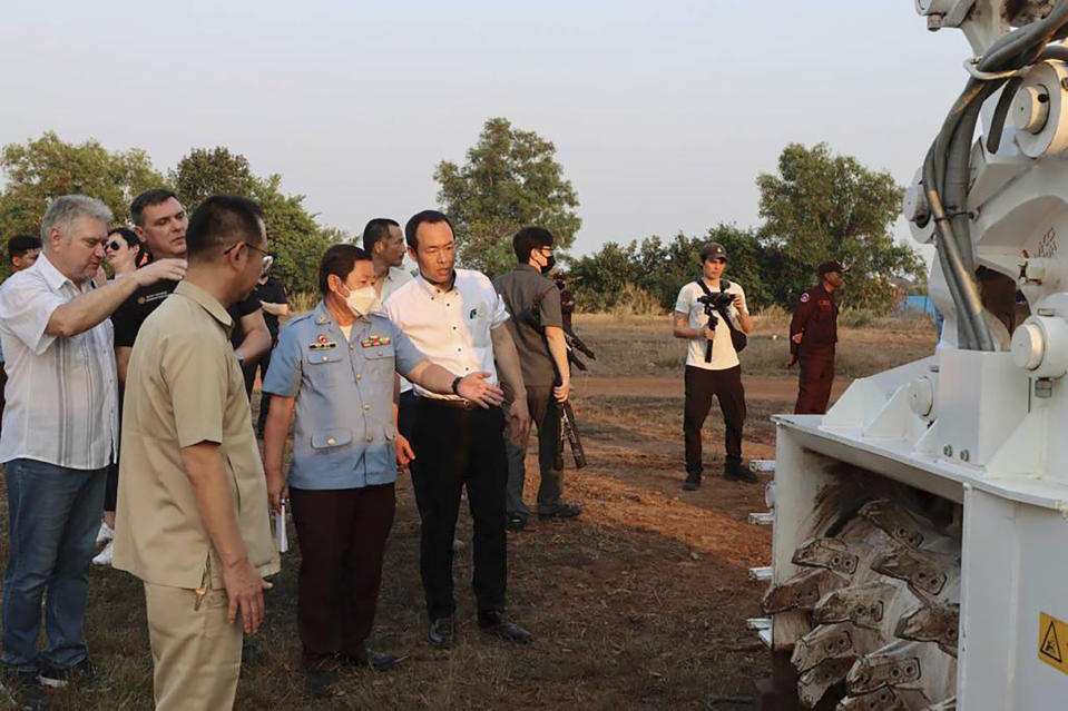 This photo released by the Cambodia Mine Action Center (CMAC), shows Ukraine deminers at Mine Action Technical Institute in the central province, Cambodia, Monday, Jan. 16, 2023. Fifteen Ukrainian deminers are being trained by experts in Cambodia who are among the world's best because of experience from clearing the leftovers of nearly three decades of war. (Cambodia Mine Action Center via AP)