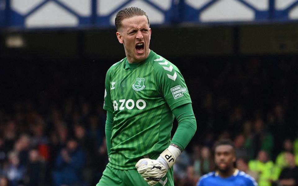 Everton's English goalkeeper Jordan Pickford (C) reacts to making a save during the English Premier League football match between Everton and Chelsea at Goodison Park in Liverpool, north west England on May 1, 2022. - GETTY IMAGES