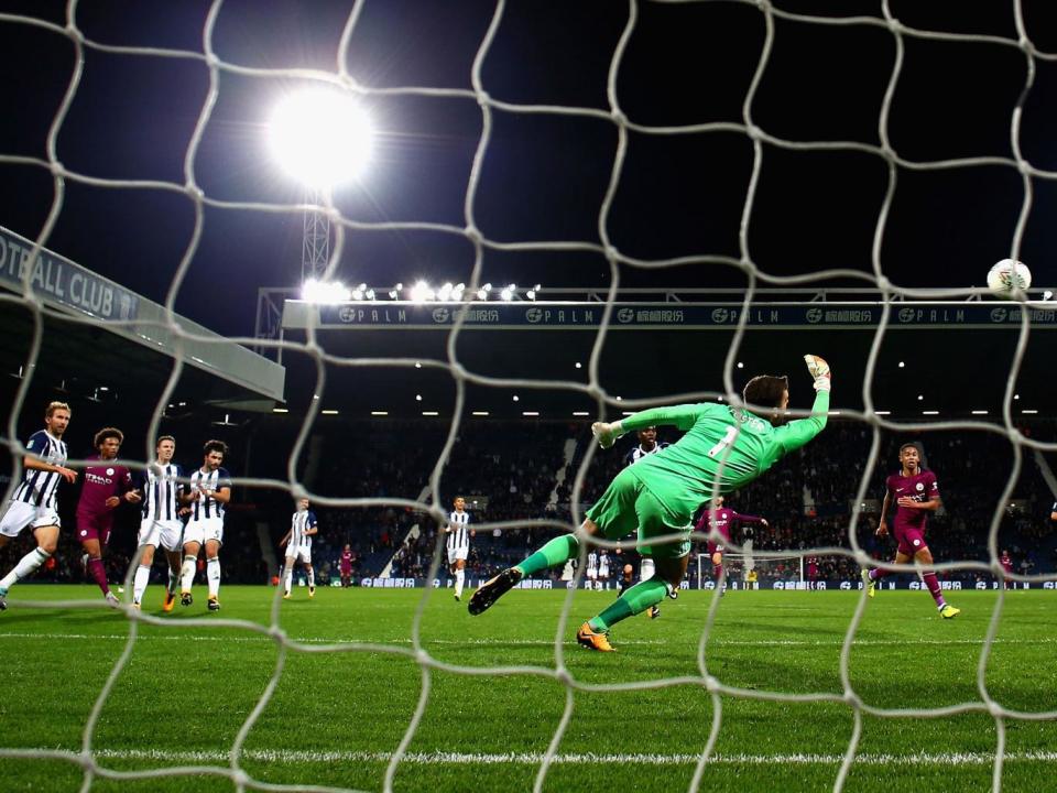 Ben Foster dives in vain to stop Sane's winning goal (Getty)