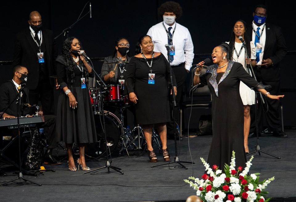 Dottie Peoples sings during Congressman John Lewis' memorial services at Trojan Arena in Troy, Ala., on Saturday, July 25, 2020.