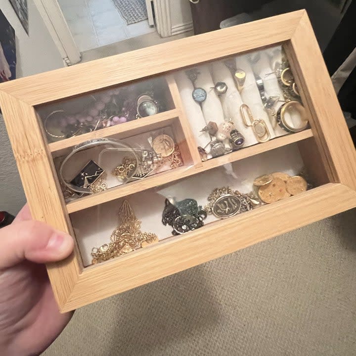 the jewelry box filled with jewelry