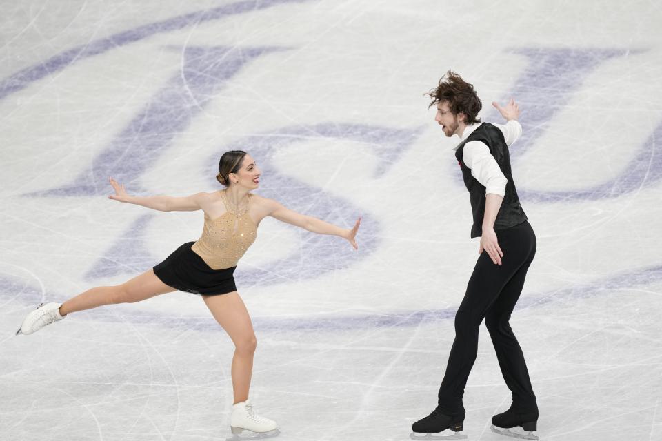 Sara Conti and Niccolo Macii of Italy perform during the pairs' short program in the World Figure Skating Championships in Saitama, north of Tokyo, Wednesday, March 22, 2023. (AP Photo/Hiro Komae)