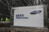 The logo of the Samsung Electronics Co. is seen at its office in Seoul, South Korea, Thursday, Jan. 28, 2021. Samsung Electronics Co. said Thursday its operating profit for last quarter rose by more than 26% as it capped off a robust business year where its dual strength in parts and finished products allowed it to thrive amid the pandemic. (AP Photo/Ahn Young-joon)
