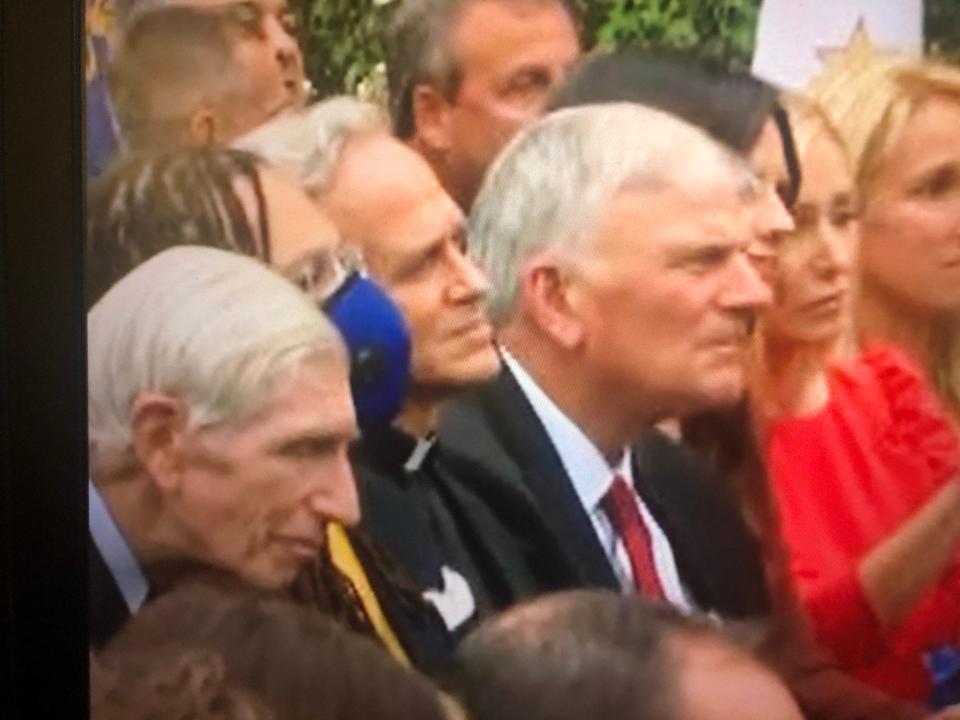 Notre Dame’s president, the Rev. John I. Jenkins, is seen without a mask and in close proximity to other attendees at the Rose Garden ceremony for Amy Coney Barrett. Two days later, Jenkins apologized for not following COVID-19 safety protocols during the ceremony.
(Credit: Tribune File Photo)