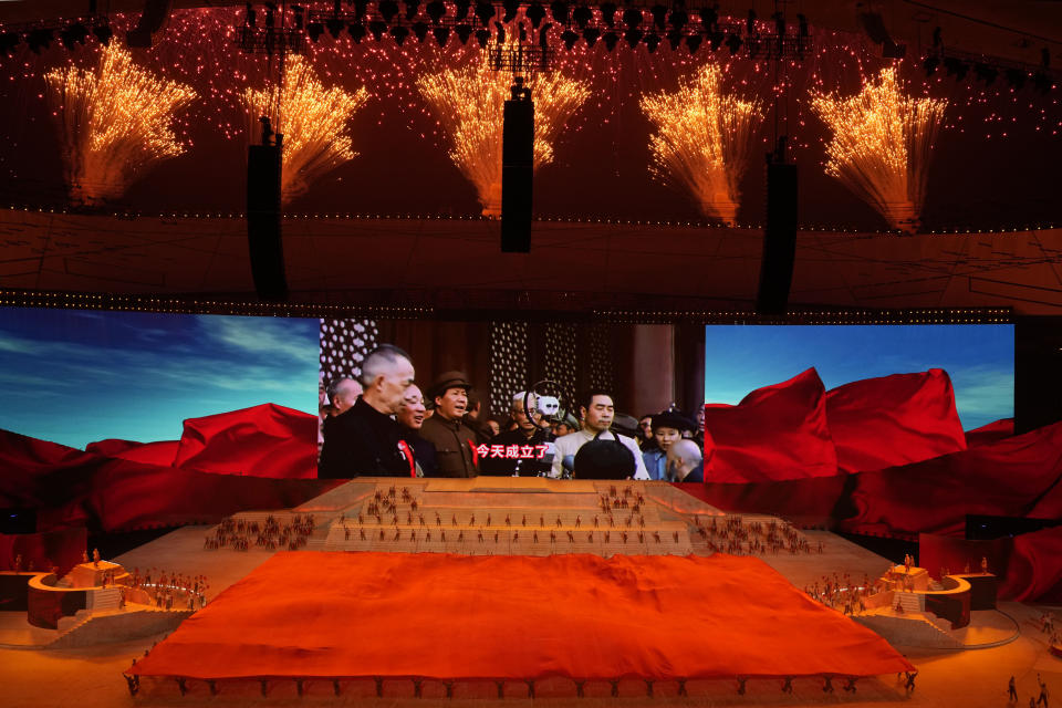 Late Chinese leader Mao Zedong is displayed on screen during a gala show ahead of the 100th anniversary of the founding of the Chinese Communist Party in Beijing on Monday, June 28, 2021. In the build-up to the July 1 anniversary, Chinese President Xi Jinping and the party have exhorted its members and the nation to remember the early days of struggle in the inland hills of Yan'an, where Mao emerged as party leader in the 1930s. (AP Photo/Ng Han Guan)