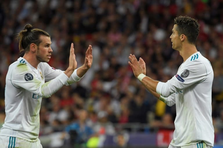 Gareth Bale (L) celebrates with Real Madrid teammate Cristiano Ronaldo during the UEFA Champions League final win over Liverpool