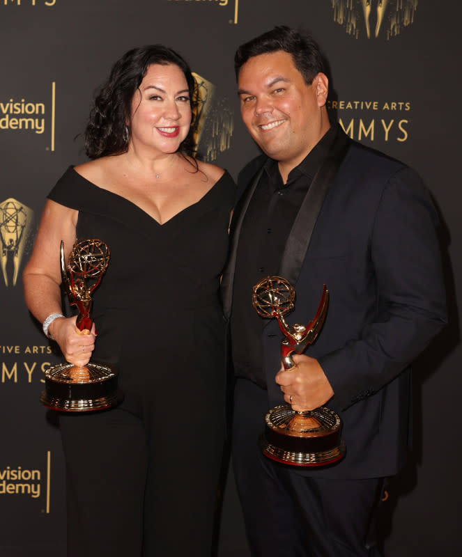 Kristen Anderson-Lopez and EGOT winner Robert Lopez pose with the award for Outstanding Original Music and Lyrics for "WandaVision" at the Creative Arts Emmys at Microsoft Theater on Sept. 12, 2021, in Los Angeles.<p>Kevin Winter/Getty Images</p>
