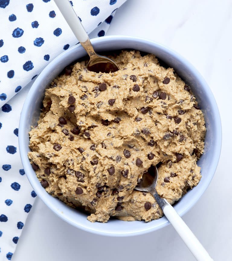 <p>Don't freak out, but the infamous <a href="https://www.delish.com/cooking/recipe-ideas/a50605/chocolate-chip-cookies-recipe/" rel="nofollow noopener" target="_blank" data-ylk="slk:chocolate chip cookie;elm:context_link;itc:0;sec:content-canvas" class="link ">chocolate chip cookie</a> now has an edible cookie dough that's actually delicious. There are only a few cookie or cake batters that are just as tasty raw as they are cooked — our version is made with graham crackers instead of flour. Tip: This recipe makes a <em>lot </em>of cookie dough (though we've never had a problem finishing it). </p><p>Get the <strong><a href="https://www.delish.com/cooking/recipe-ideas/recipes/a51088/edible-cookie-dough-recipe/" rel="nofollow noopener" target="_blank" data-ylk="slk:Edible Cookie Dough recipe;elm:context_link;itc:0;sec:content-canvas" class="link ">Edible Cookie Dough recipe</a></strong>. </p>