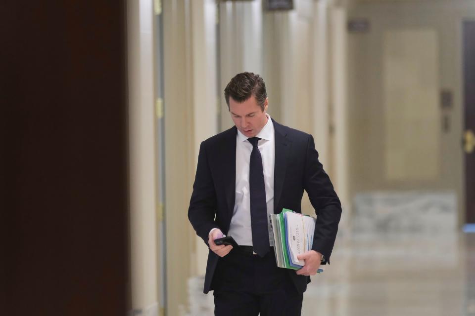 Sen. Adam Pugh makes his way to the Senate Education Committee meeting last month at the Oklahoma Capitol.