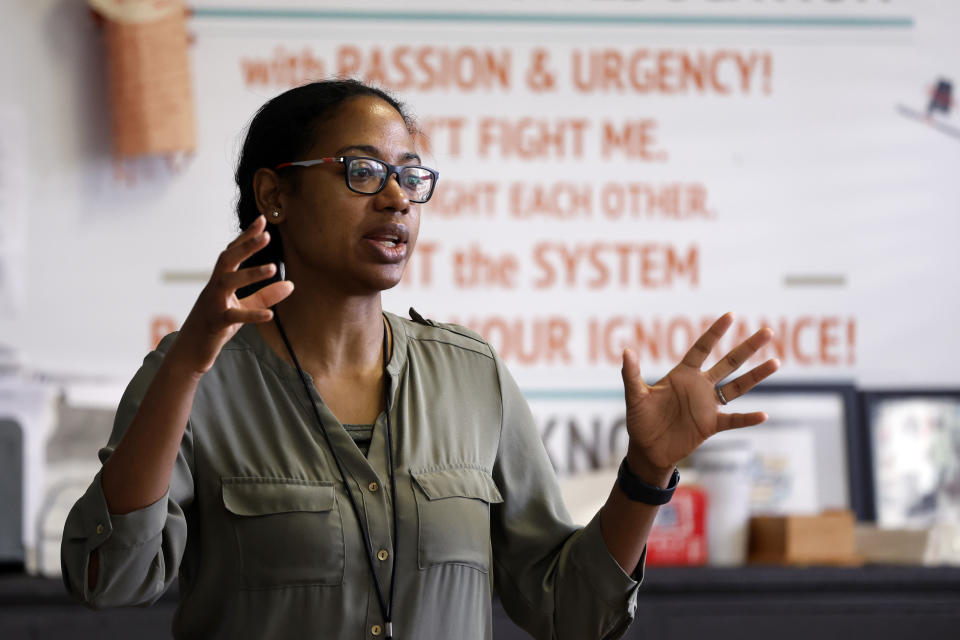 S'Heelia Marks gives instruction to students to prepare them for the digital SAT, Wednesday, March 6, 2024, at Holy Family Cristo Rey Catholic High School in Birmingham, Ala. (AP Photo/Butch Dill)