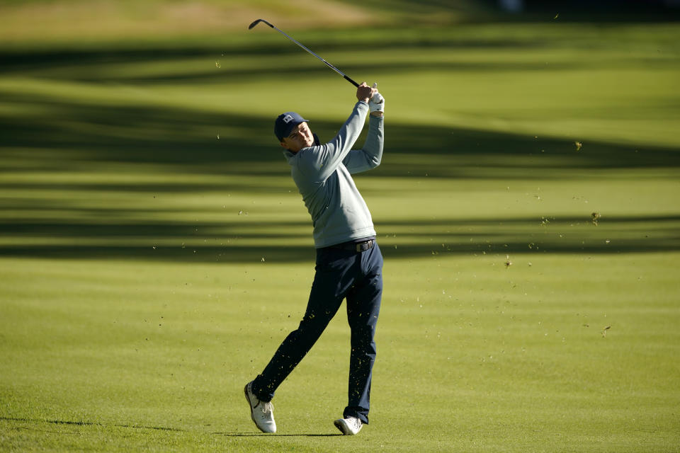 Jordan Spieth hits his second shot on the 13th hole during the second round of the Genesis Invitational golf tournament at Riviera Country Club, Friday, Feb. 19, 2021, in the Pacific Palisades area of Los Angeles. (AP Photo/Ryan Kang)