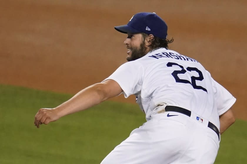 Los Angeles Dodgers starting pitcher Clayton Kershaw follows through on a pitch during the sixth inning.