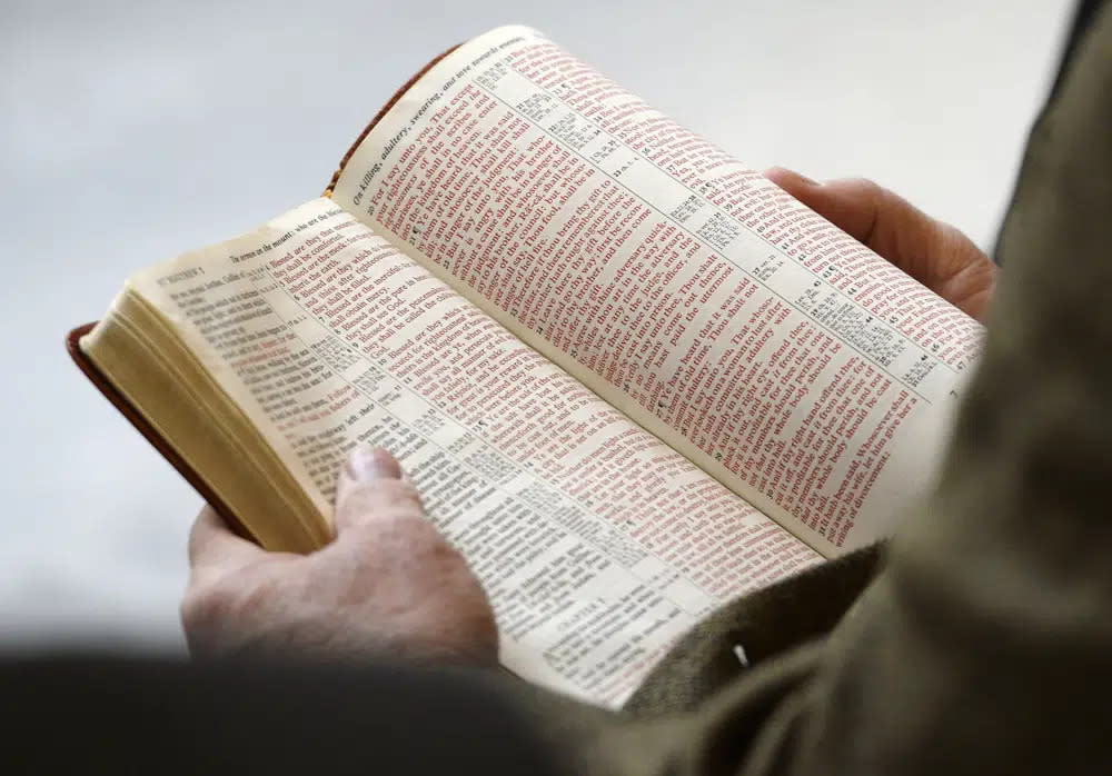 The Bible is read aloud at the Utah Capitol, Monday, Nov. 25, 2013. (Steve Griffin/The Salt Lake Tribune via AP)