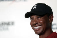 Tiger Woods smiles during a news conference with Phil Mickelson at Shadow Creek Golf Course in North Las Vegas Tuesday, Nov. 20, 2018. The golfers will face off in a match play event on Friday. (Steve Marcus/Las Vegas Sun via AP)